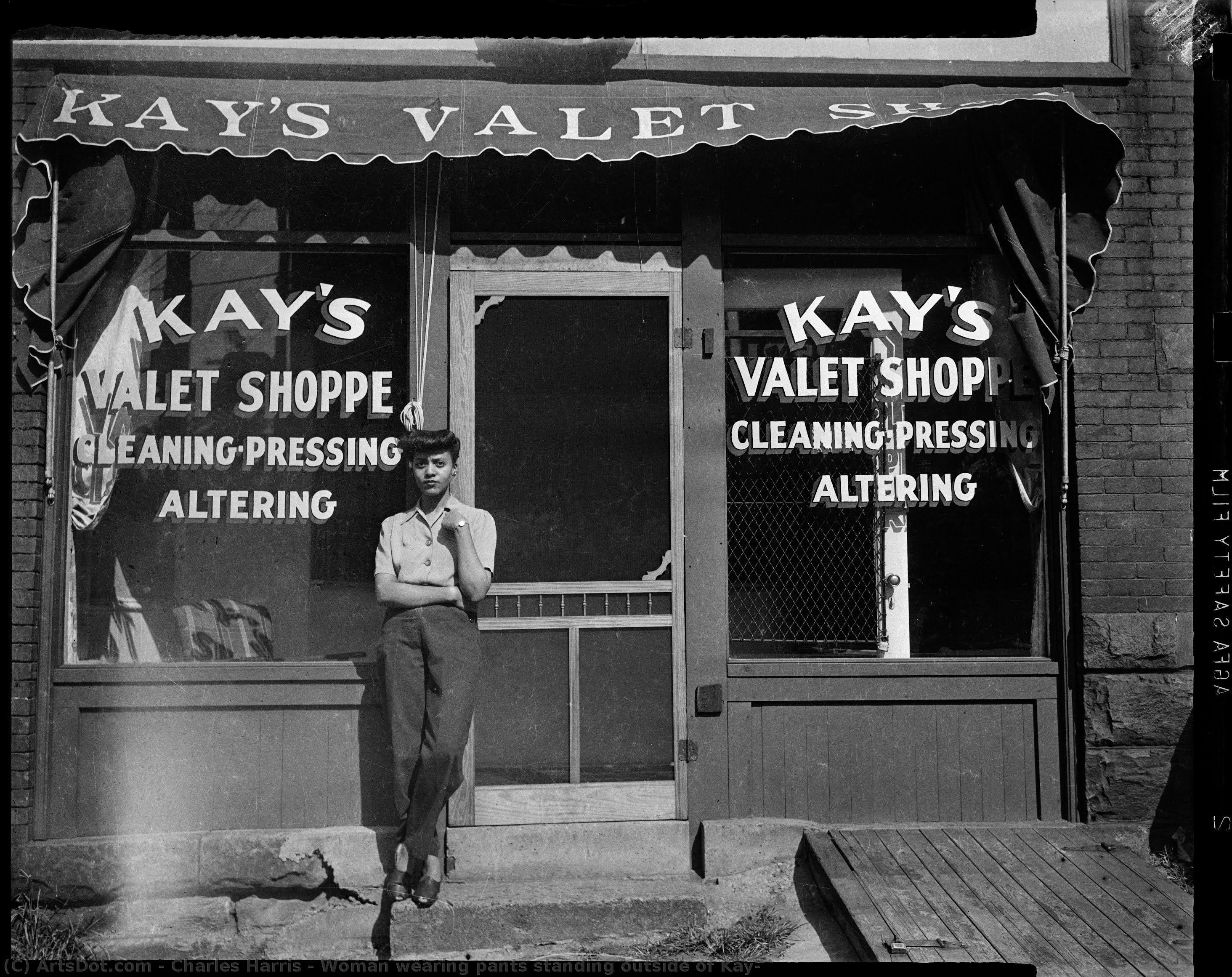 Woman Wearing Pants Standing Outside Of Kay — Charles Harris