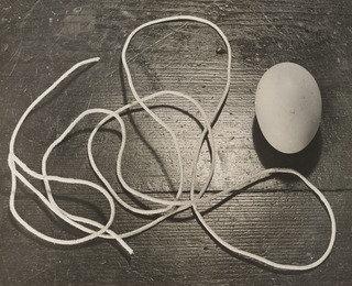 Still Life With Egg And Twine — Horacio Coppola