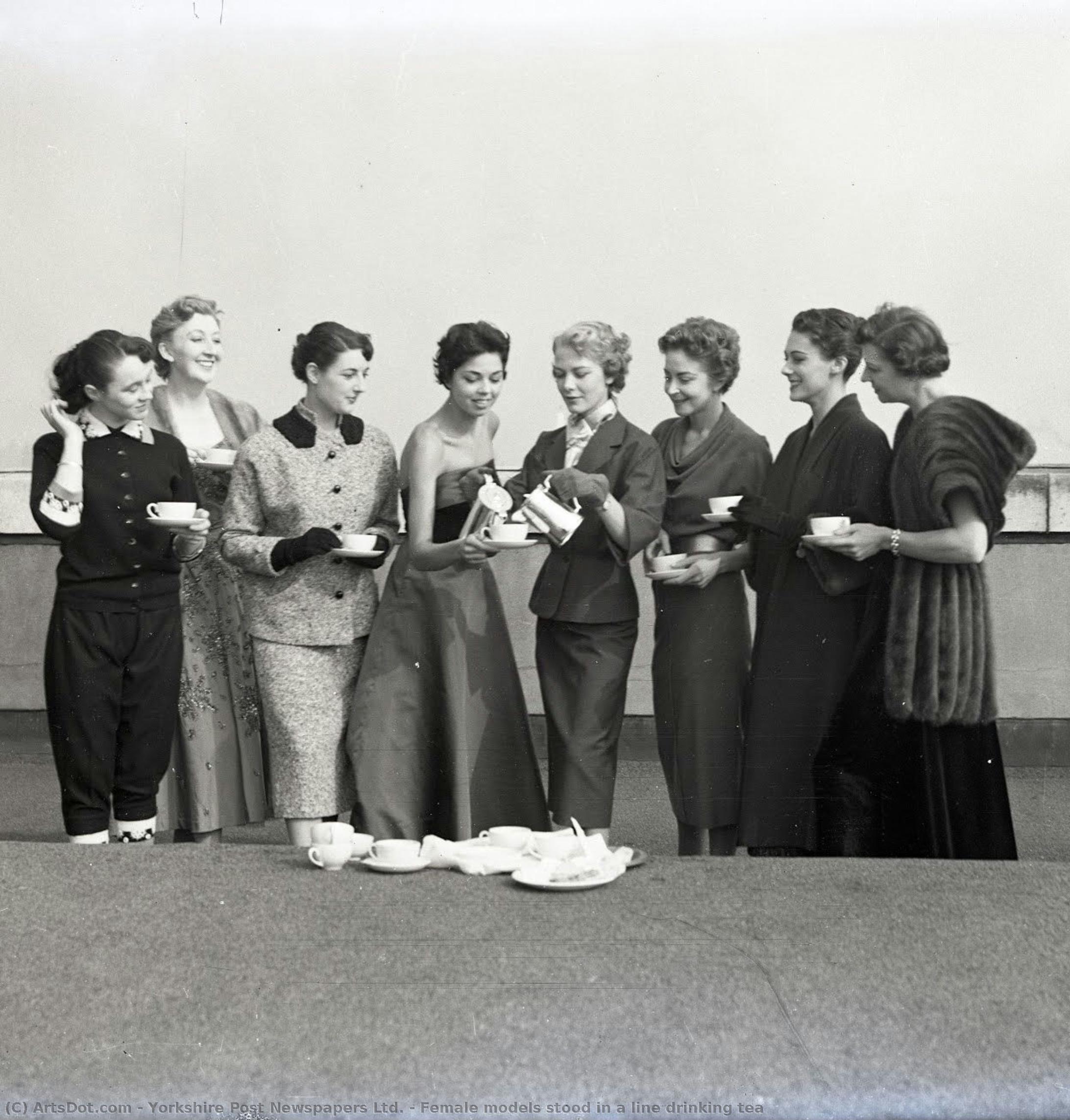 Female Models Stood In A Line Drinking Tea — Yorkshire Post Newspapers Ltd.