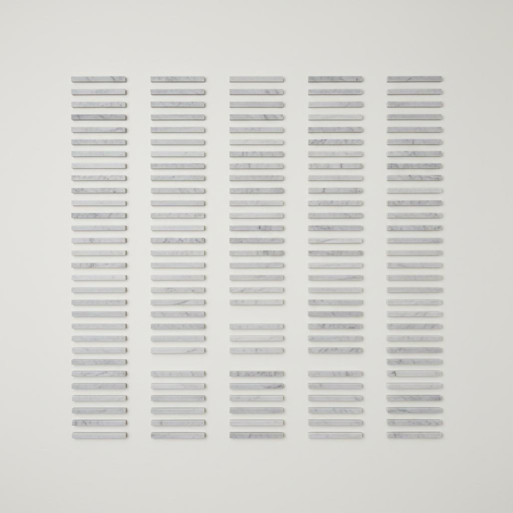 Monolithic Rhythms In Marble: A Serene Study Of Geometric Order And Light — David Moreau