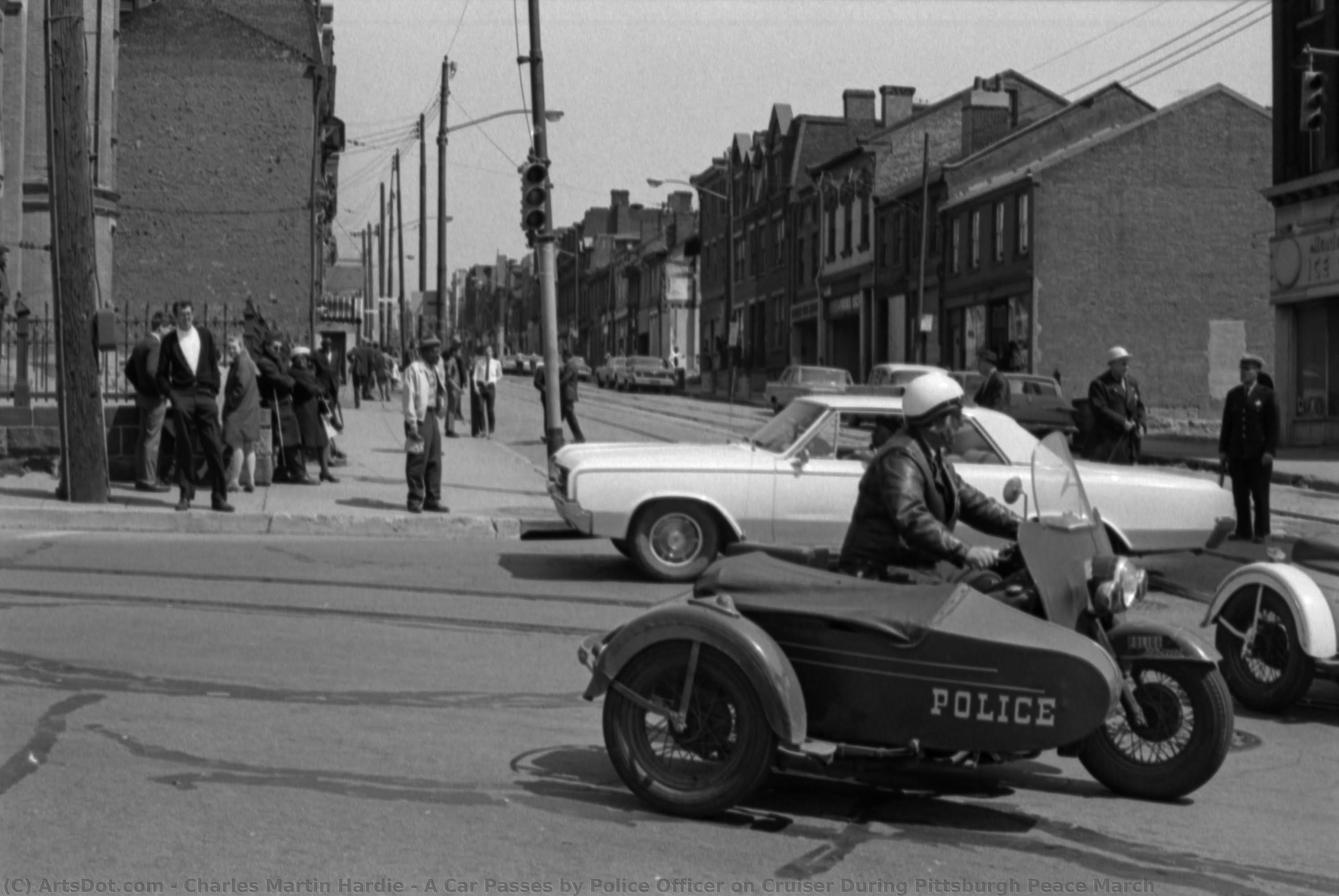 A Car Passes By Police Officer On Cruiser During Pittsburgh Peace March — Charles Martin Hardie