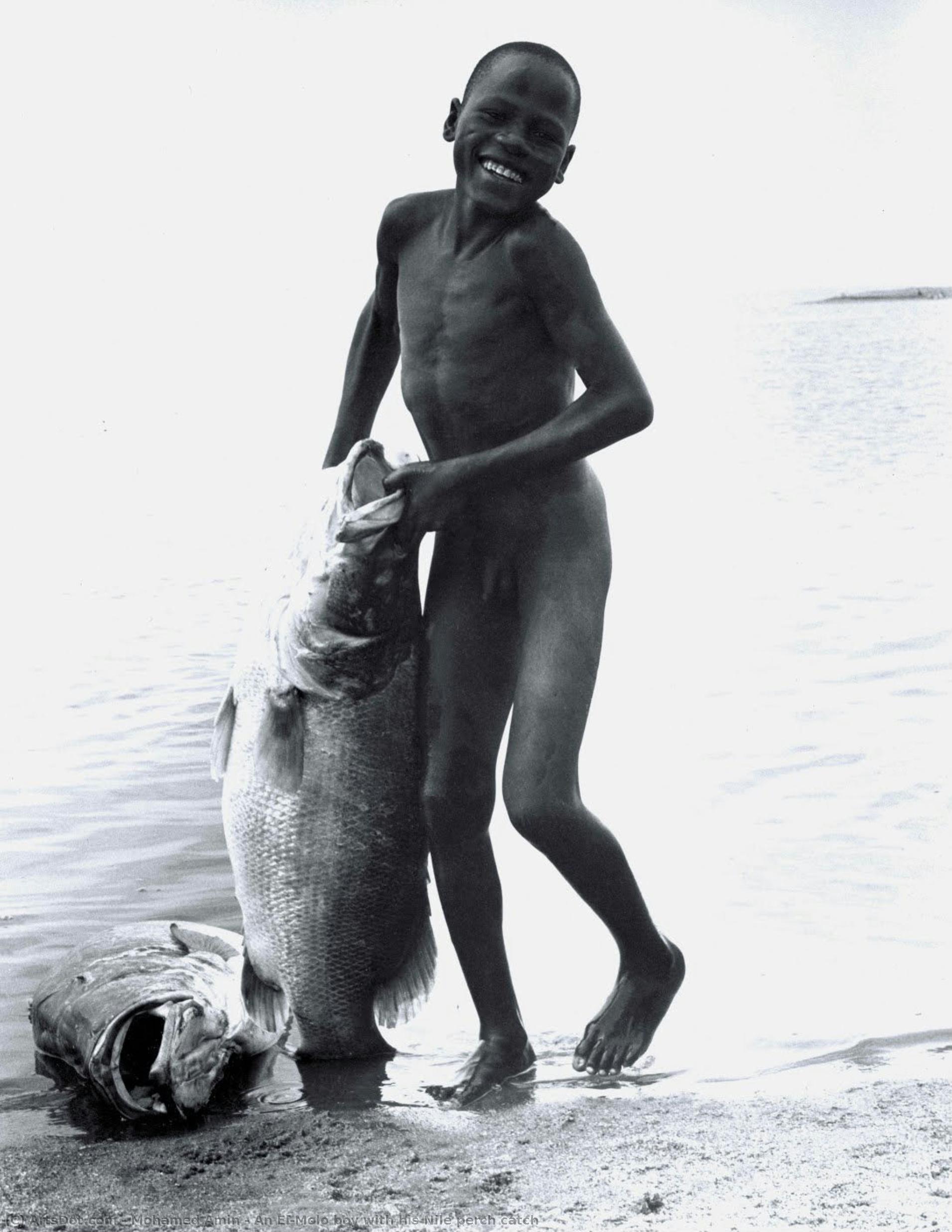 An El-molo Boy With His Nile Perch Catch — Mohamed Amin