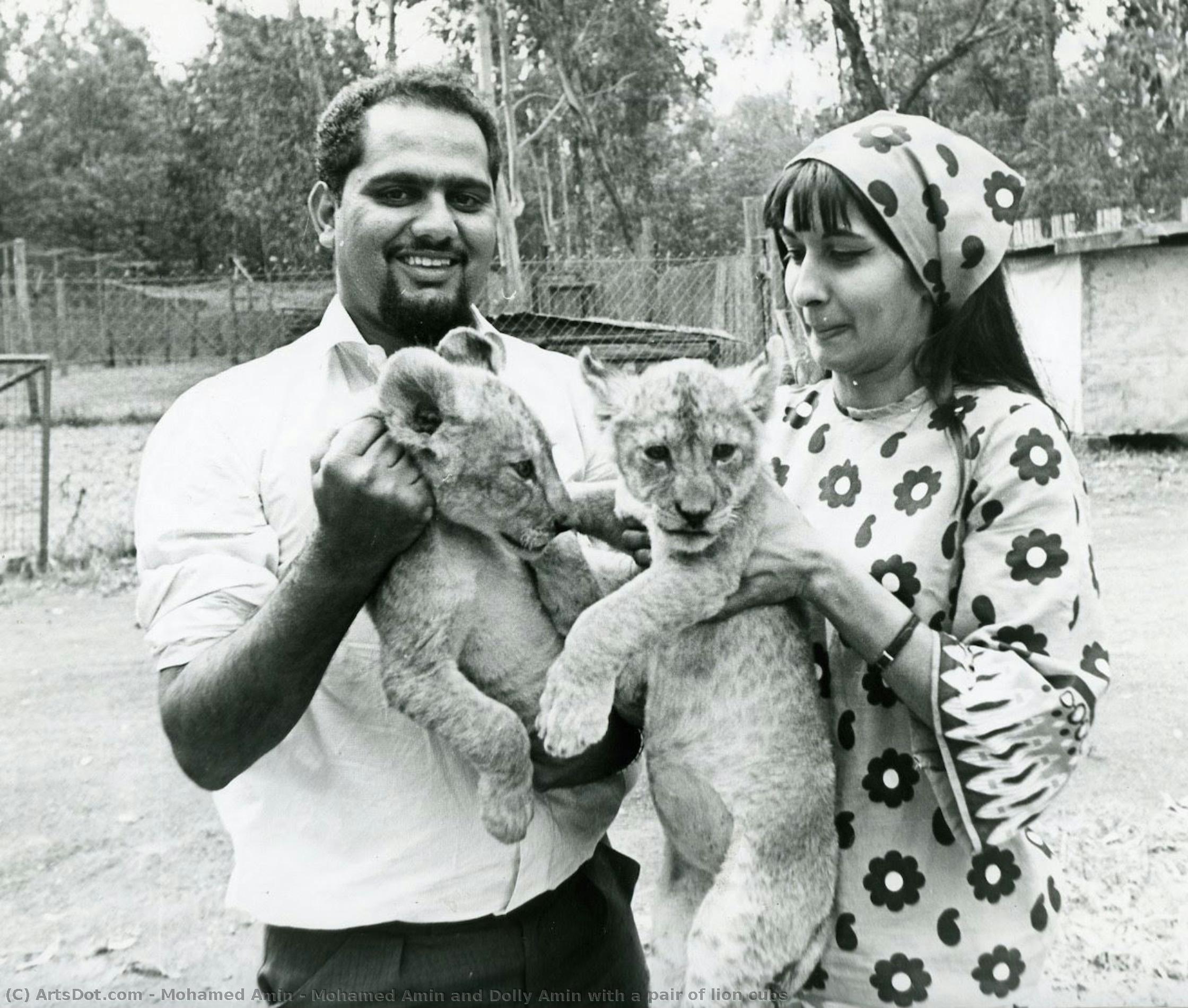 Mohamed Amin And Dolly Amin With A Pair Of Lion Cubs — Mohamed Amin