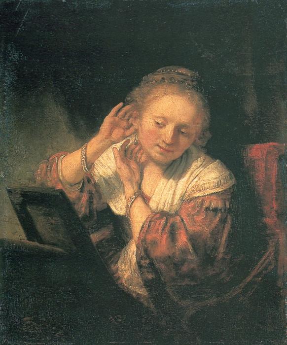 Young Woman At A Mirror — Рембрант