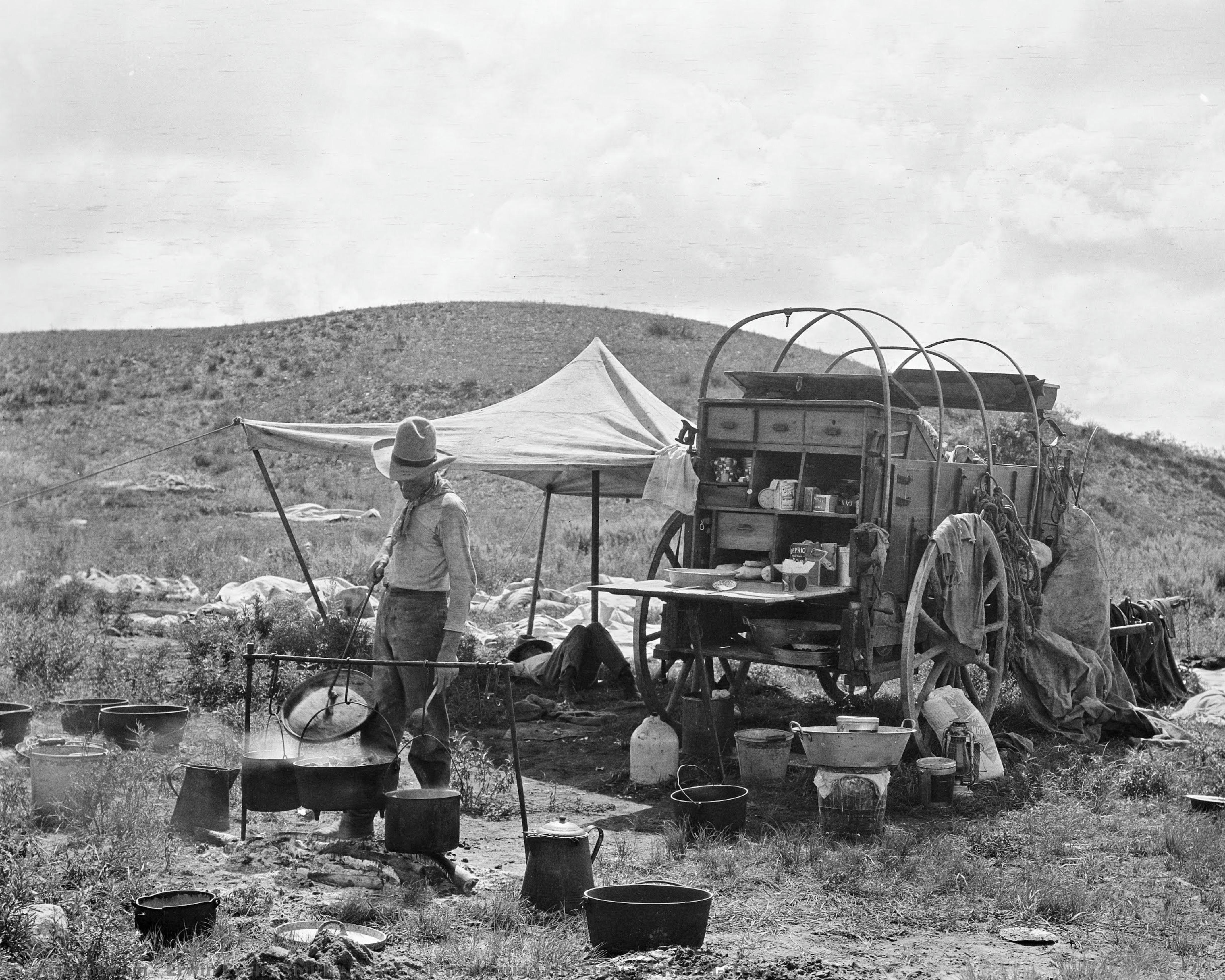 A Ja Cook Inspecting His Stew, Ja Ranch, Texas — Erwin Evans Smith