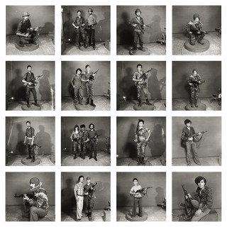 After They Got The Right To Arms. Fourteen Young Men Posing With Guns — Akram Zaatari