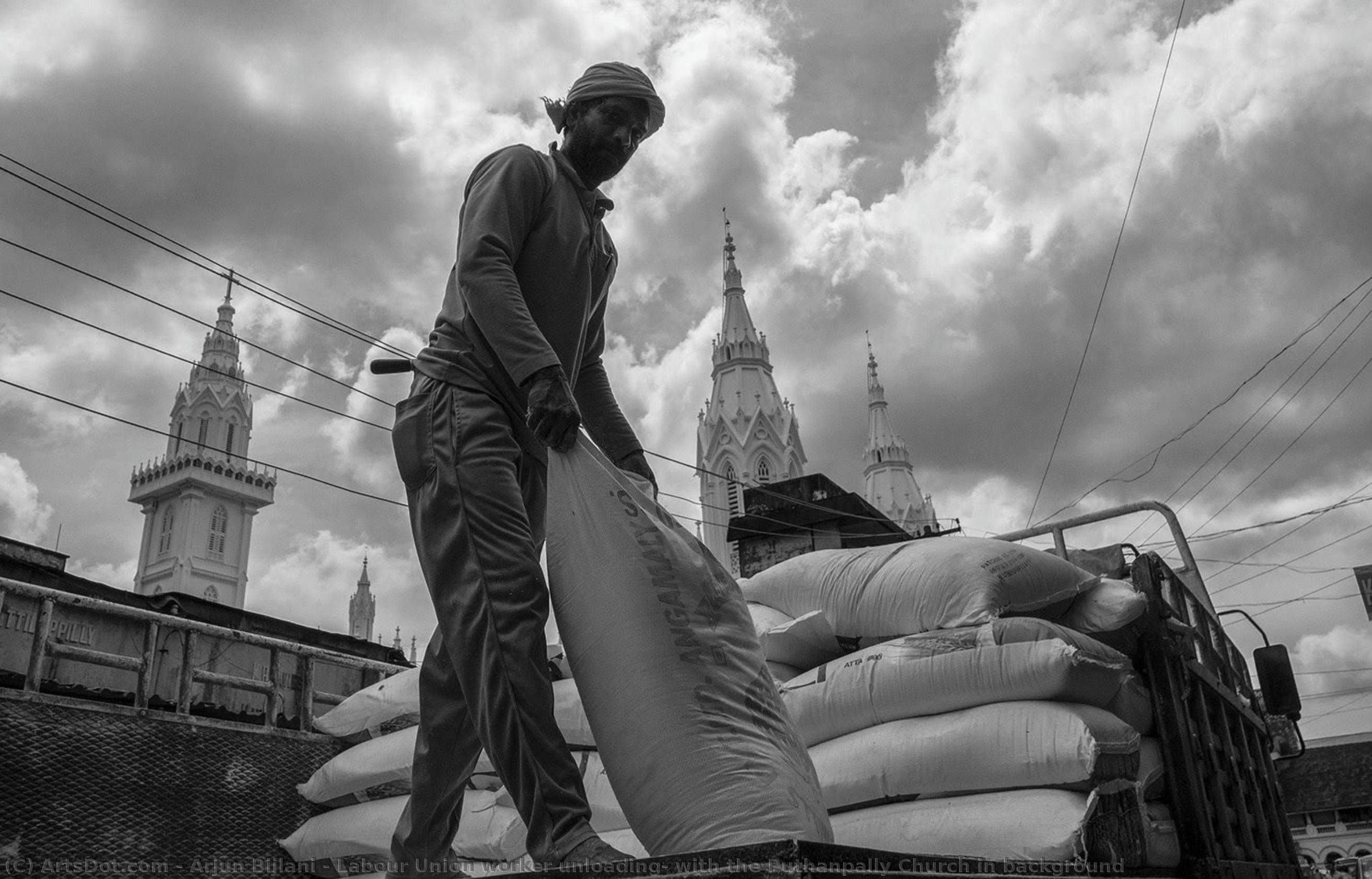 Labour Union Worker Unloading, With The Puthanpally Church In Background — Arjun Bijlani