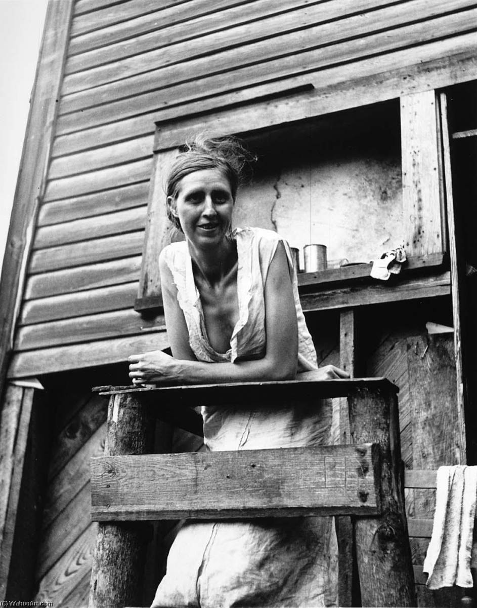 Miner's Wife On Porch Of Their Home, An Abandoned Company Store. Pursglove, West Virginia — Marion Post Wolcott