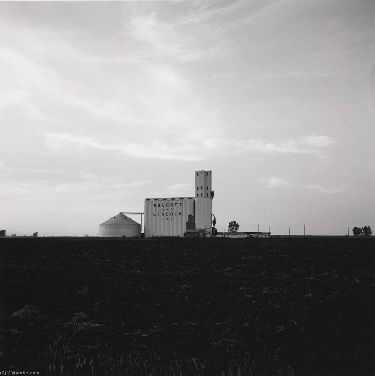 Grain Elevator And Plowed Field, Wellington, Kansas, 1973 — Frank Gohlke