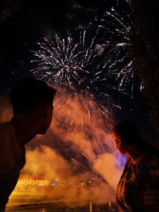 My daughter Eleonora and nephew Noa watch fireworks during midsummer bonfires