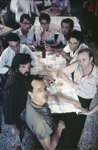 From Left To Right, From The Head Of The Table, In The Foreground: Nelson Pereira Dos Santos (polo Shirt); Ruy Guerra (beard); Joaquim Pedro De Andrade; Walter Lima Jr. (wearing Glasses, With A Pack Of Cigarettes In His Hand); Zelito Viana (wearing G.... — David Drew Zingg