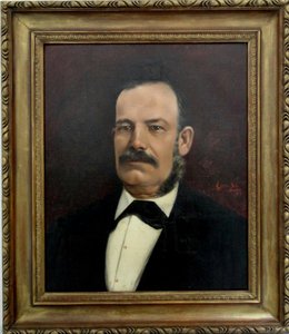 Front portrait, hair, mustache and whole gray sideburns. He wears a black jacket and bow tie, a white shirt. Dark red background. Signature in red EUGENIA BELIN SARMIENTO / 1889 on the left shoulder.