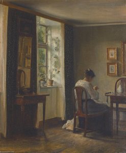 Seamstress sewing in an interior