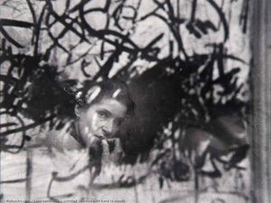 Untitled (woman with hand to mouth)