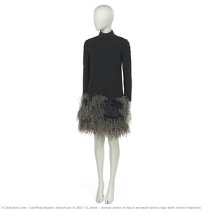 Dinner dress of black worsted wool crepe with ostrich feathers