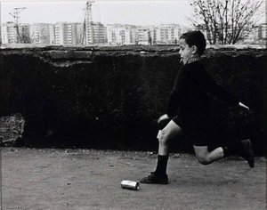 Rome (running boy kicking can)