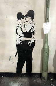 Kissing Coppers — Banksy