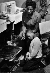 Family Crowds Around Open Oven For Warmth, Harlem, New York — Gordon Parks, Contemporary Realism