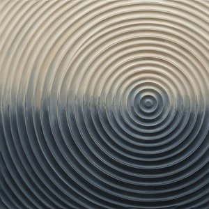 Monolithic Echoes Of Eternal Equilibrium In Sculpted Cream And Charcoal Relief — Laurent Fabre, Neo-abstract Art