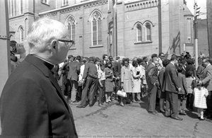 A Man Watches As Marchers Gather At Corner During Pittsburgh Peace March — Charles Martin Hardie