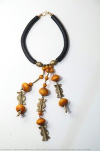 African Heritage necklace of amber and cast brass beads, with coconut shells