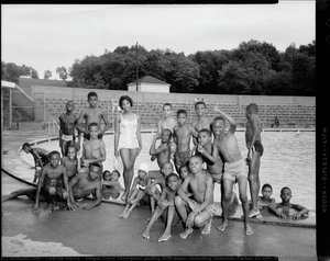 Singer Carol Thompson Posing With Boys, Including Sherman Parker On Left, Harold Wilkes On Right, Louis Murrell Jr. On Right In Pool, And Donald — Charles Harris