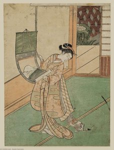Woman Hanging A Scroll And Playful Cat — Suzuki Harunobu