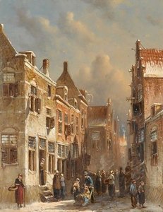 Figures in the snow covered streets of a dutch town