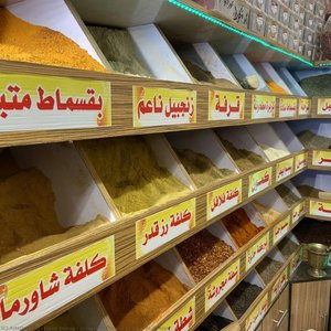 Spices On Shelves At Souk Al-zawiya — Jason Shawa, Contemporary Realism