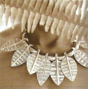 Turkana aluminium earrings and Akamba aluminium legbells