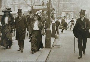Suffragettes heckling the Prime Minister in Downing Street