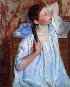 La Niña Peinando su Pelo
