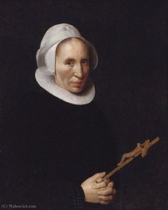 A lady holding a crucifix