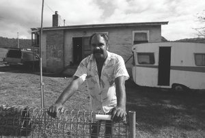 Untitled (Bellbrook NSW, man leaning on fence)
