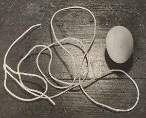 Still Life With Egg And Twine — Horacio Coppola