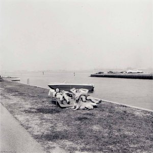 Untitled (2 People And Dog, Sunning Near Waterway) — Burk Uzzle