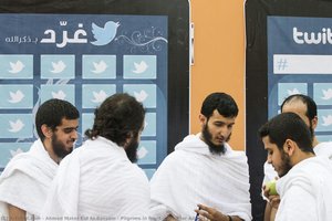 Pilgrims in front of Twitter Advert