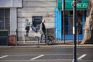 Girl Atm — Banksy