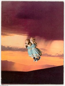 Untitled (mountainous landscape at sunset with pair of female figureheads)