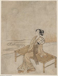 Young Woman Viewing The Full Moon On A Summer Evening