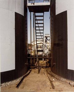 Two Storage Tanks with Connecting Steps