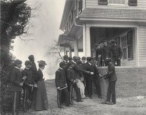 Arithmetic Lesson Under A Student Mason — Frances Benjamin Johnston