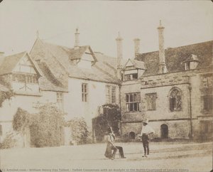 Talbot Converses With An Acolyte In The North Courtyard Of Lacock Abbey — William Henry Fox Talbot