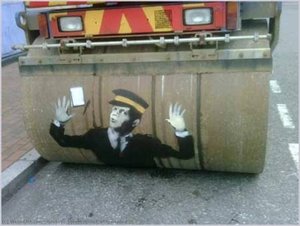 Steam Roller Traffic Warden — Banksy