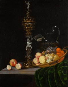 Still Life With An Elaborate Silver Gilt Standing Cup, A Basket Of Fruit, And A Glass Wine Jug Upon A Partly Draped Table — Johann Georg Hinz