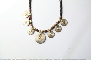 African Heritage necklace of cast brass, coconut shell and volcanic clay beads