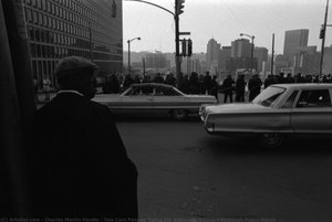 Two Cars Pass as Police For Barricade During Pittsburgh Peace March