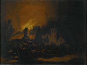 A fire in a village at night