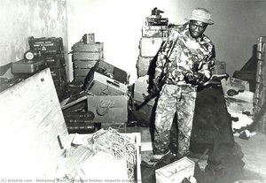 Tanzania Soldier Inspects Arms Dump — Mohamed Amin