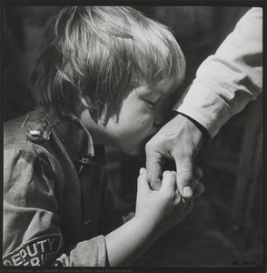 Boy Kissing Hand — Jan Saudek